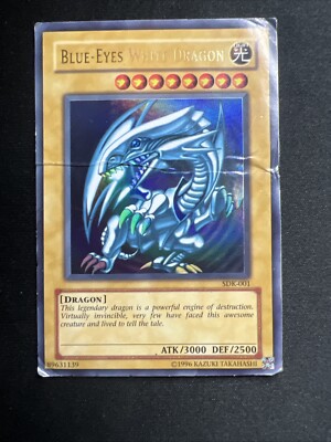 Blue-Eyes White Dragon SDK-001 Starter Deck: Kaiba Unlimited DMG/creased-image