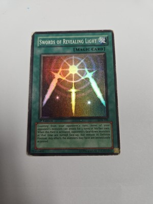 Swords of RevealingLight LOB-101The Legend of Blue Eyes White Dragon 1st Edition-image