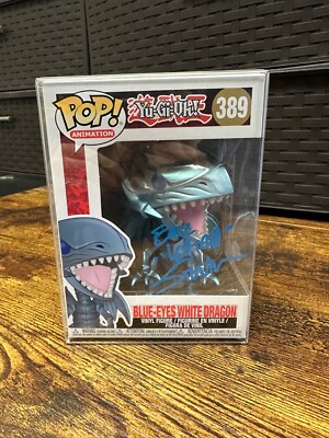JSA Signed Eric Stuart Funko Yu-Gi-Oh! Blue Eyes White Dragon 389 w Protector-image