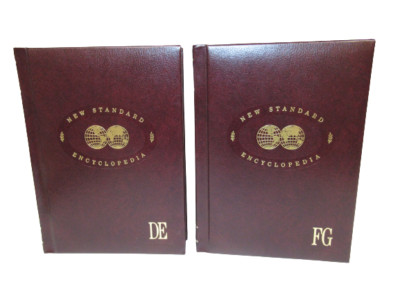 Lot of 2 New Standard Encyclopedias Volumes 