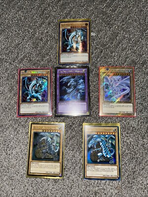 5 Blue Eyes White Dragons And Blue Eyes Ultimate Dragon All In One.-image