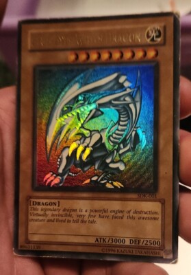 x1 Yugioh Blue-Eyes White Dragon SDK-001 Unlimited Card - Yu-Gi-Oh TCG - HP Cond-image