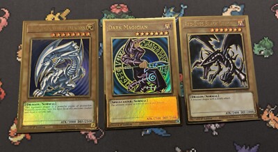 Blue Eyes Dark Magician Red Eyes Mago Premium Gold Trio NM-image