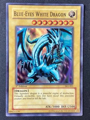Yugioh SKE-001 Blue-Eyes White Dragon 1st Ed Super Rare HP (Scuffing, Scratches)-image
