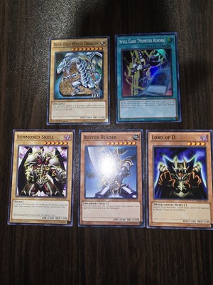 blue eyes white dragon, Buster Blader, Summoned Skull, Lord Of D & Spell Card...-image