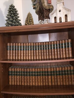 48 volume set of leather books by Charles Dickens.  Excellent condition. 1891.-image