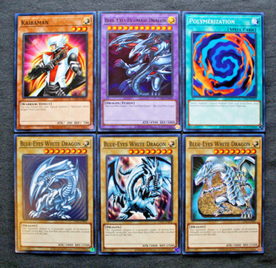 Blue-Eyes Ultimate Dragon fusion set: 3x Blue-Eyes White Dragon original/alt art-image