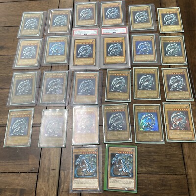 Blue Eyes White Dragon Psa 9 Spanish 1st With 25 Eng Versions & More! Yugioh Lot-image