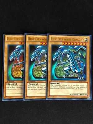 YUGIOH BLUE-EYES WHITE DRAGON SDBE-EN001 1ST ULTRA HP/CREASES X3-image