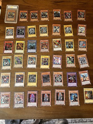 Assortment of Yu-Gi-Oh! Cards. Blue Eyes, Red Eyes, Dark Magician And Others!  -image
