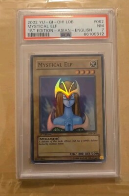 2002 Yu-Gi-Oh! LOB-062 Mystical Elf - 1st Edition Asian-English PSA 7 Blue Eyes-image