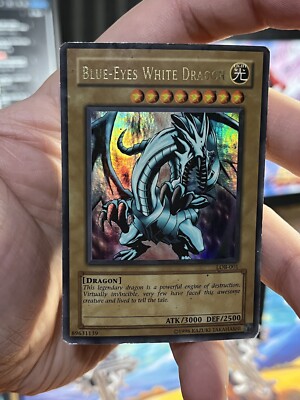 WAVY Yugioh  2002 Blue-Eyes White Dragon LOB-001 Ultra Rare Unlimited-image