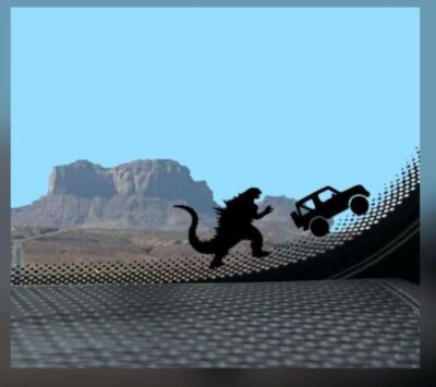 Tiny Godzilla Chasing 2 Door SUV Car Decals-image