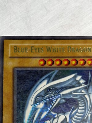 2002 Yu-Gi-Oh! Blue Eyes White Dragon SDK-E001 MP Misaligned Name Misprint Error-image