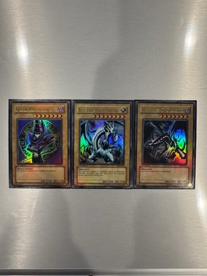 Blue Eyes White Dragon, Dark Magician, Red eyes Black Dragon Lob 1st Asian En-image