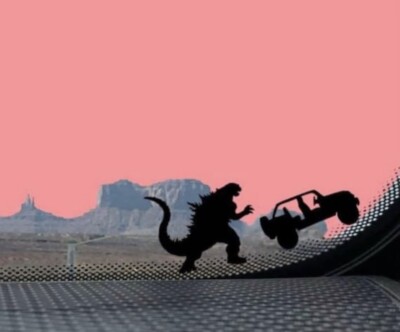 Tiny Godzilla Chasing 4 Door SUV Car Decal-image
